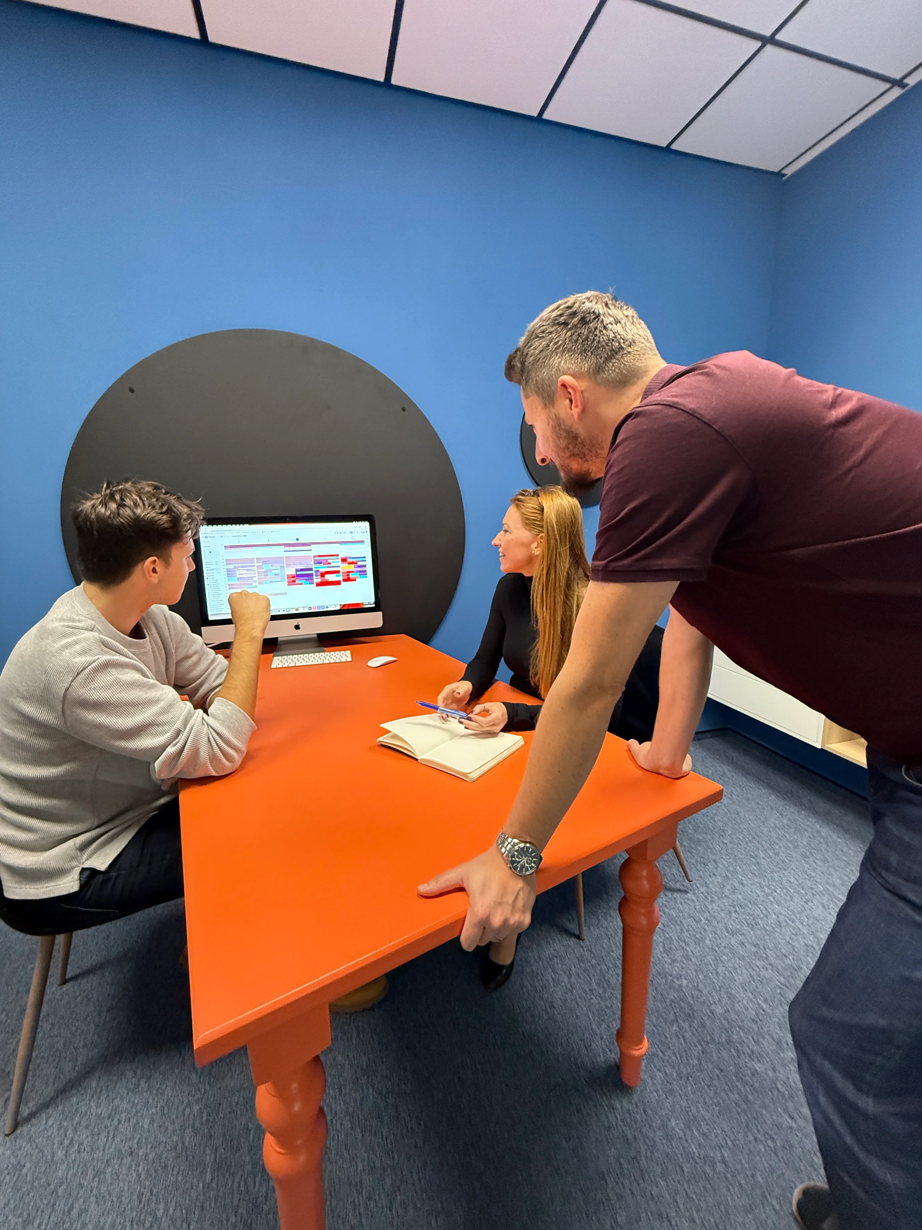 MIME Team meeting around table